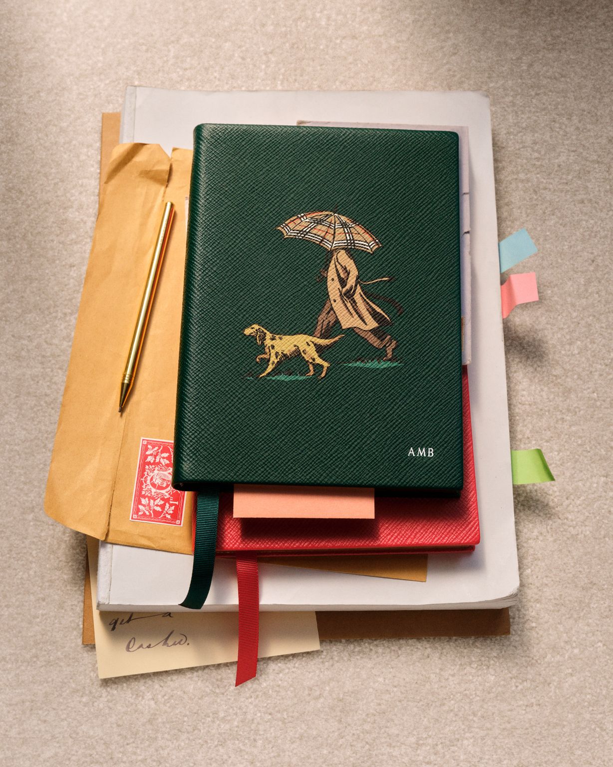 Illustrated green notebook from the Burberry and Smythson collaboration.