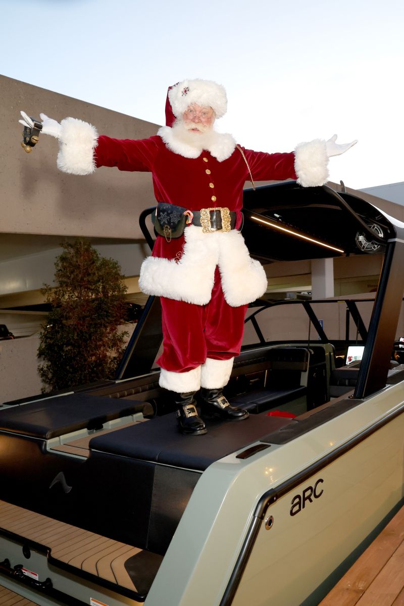 Santa with an Arc boat at the Neiman Marcus holiday event.