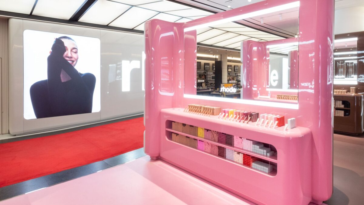Pink Rhode display with integrated product shelves