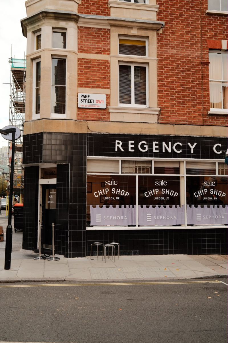 Regency Café exterior with Saie Chip Shop and Sephora signage
