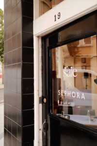 Saie x Sephora signage on the Regency Café door