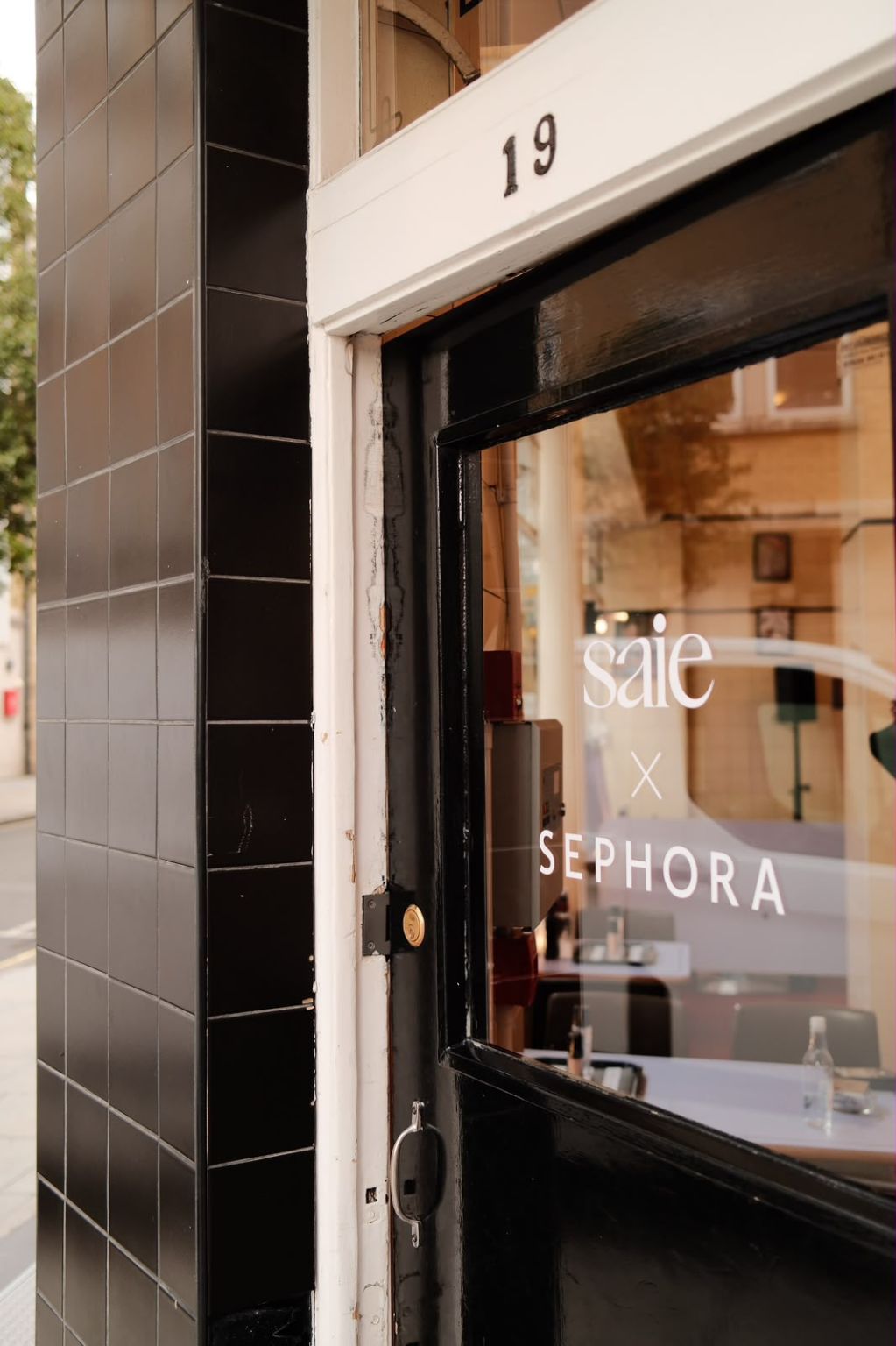 Saie x Sephora signage on the Regency Café door