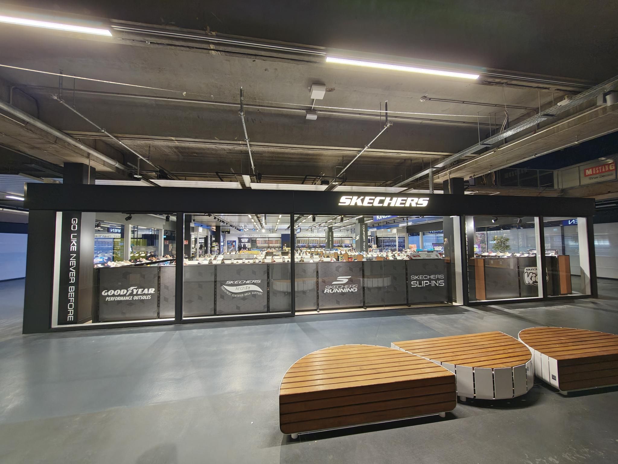 Skechers storefront and seating area at Seemaxx Outlet Center
