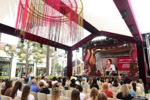 Wide angled view of the Jamie Chung fashion keynote stage at StyleWeekOC on October 17, 2026