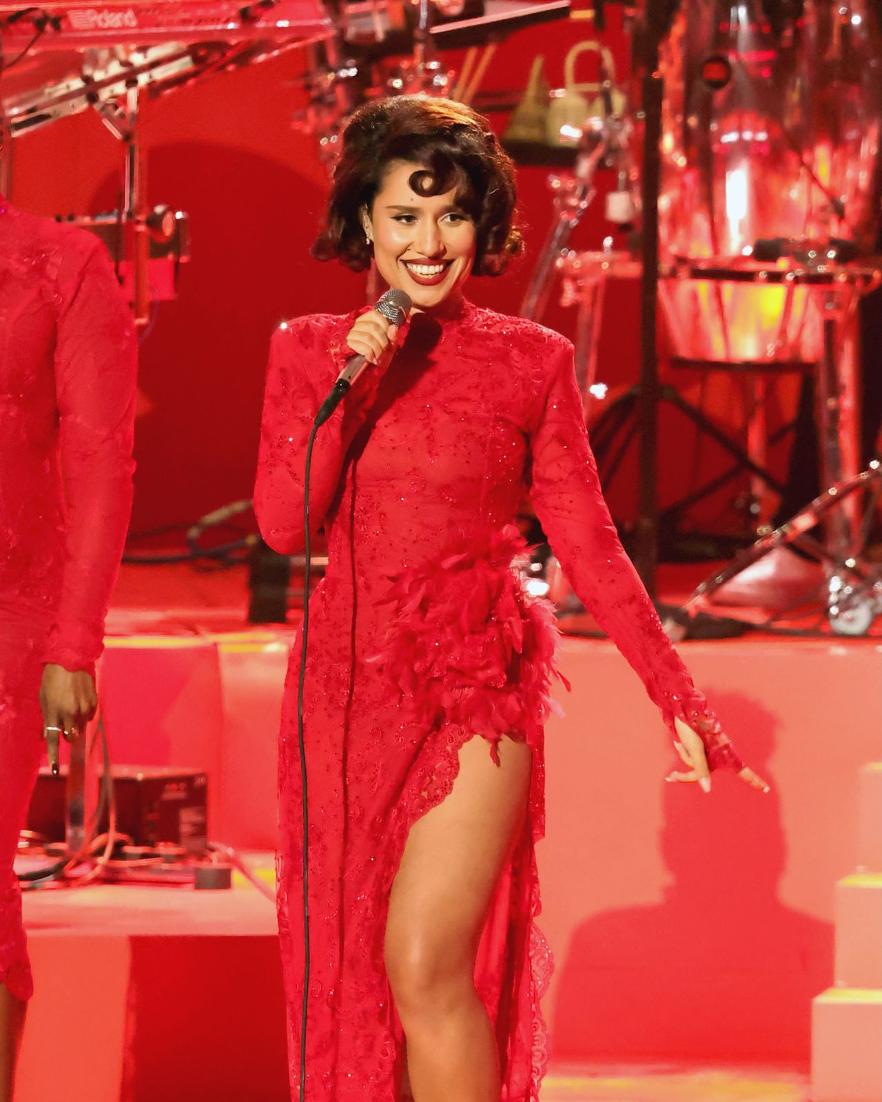 RAYE wearing a red Rowen Rose look embellished with Swarovski crystals (1 of 3)