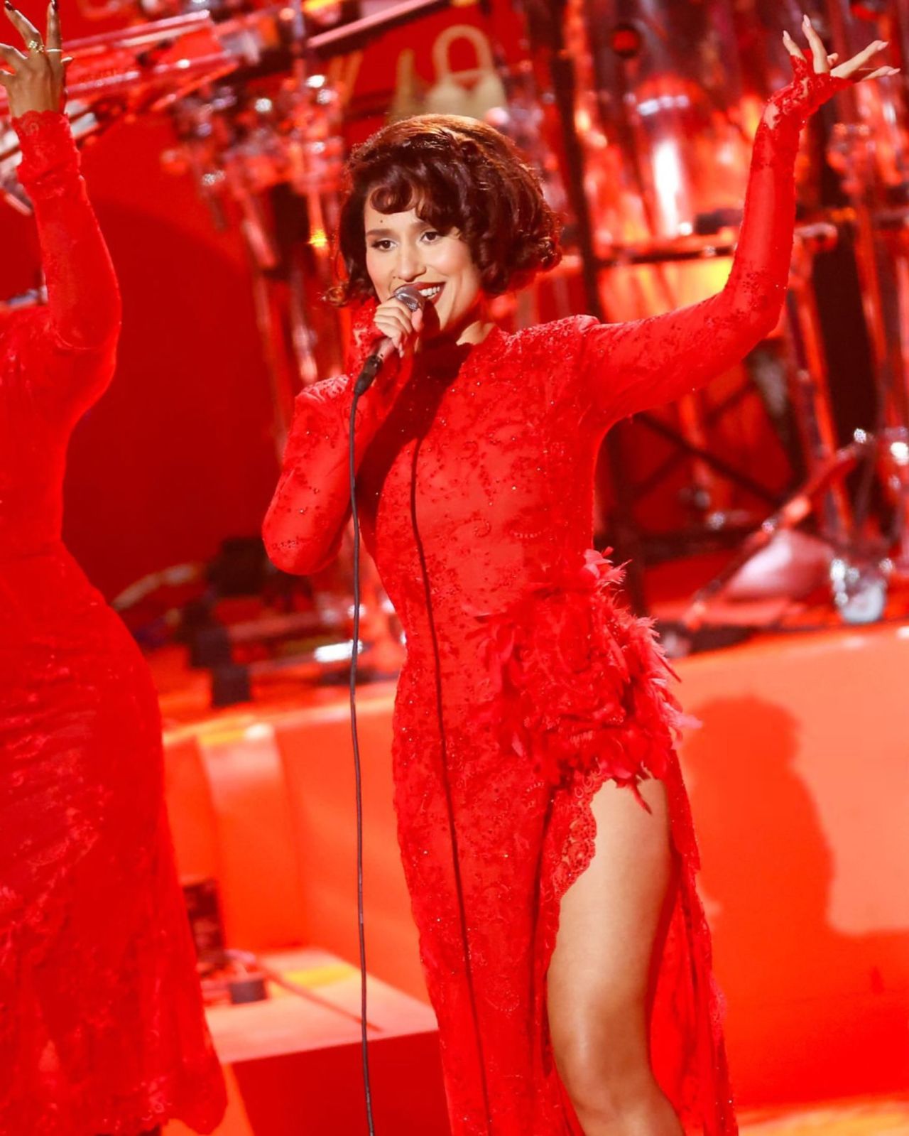 RAYE wearing a red Rowen Rose look embellished with Swarovski crystals (3 of 3)