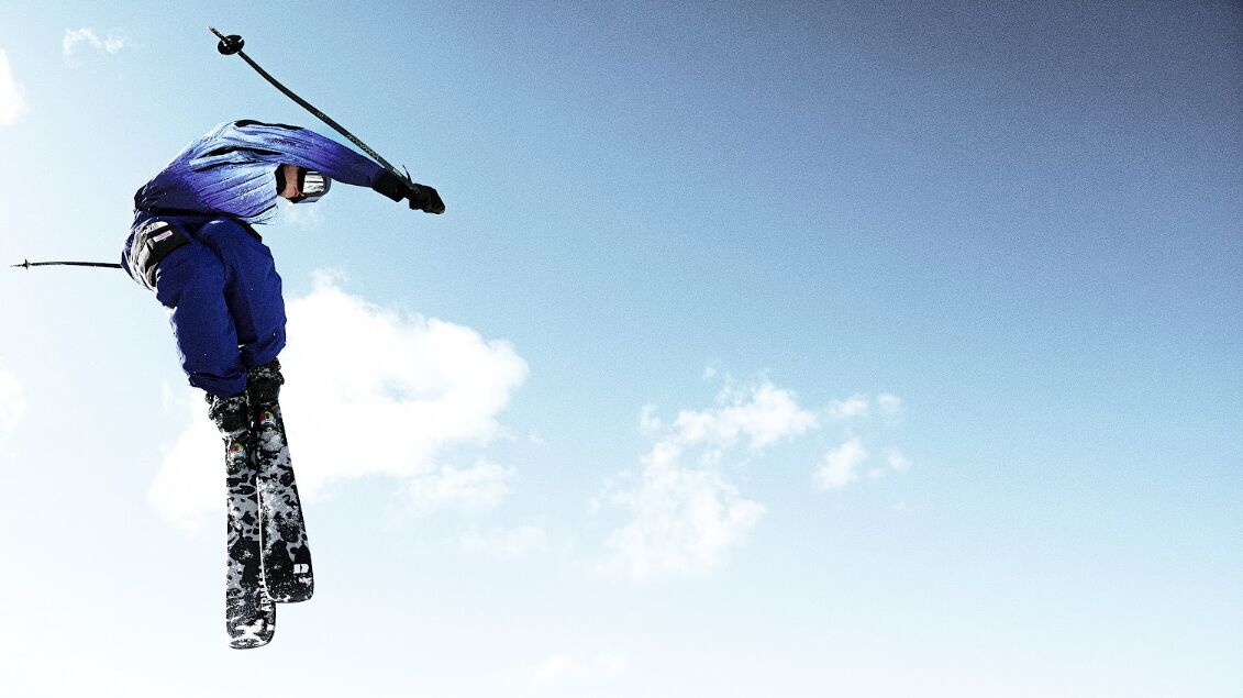 Skier airborne in a U.S. Ski & Snowboard campaign photograph