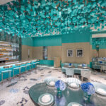 Interior of Blue Box Café at Tiffany & Co. South Coast Plaza with Tiffany Blue accents and a glass installation