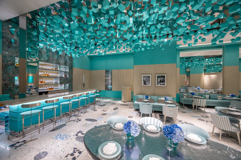 Interior of Blue Box Café at Tiffany & Co. South Coast Plaza with Tiffany Blue accents and a glass installation