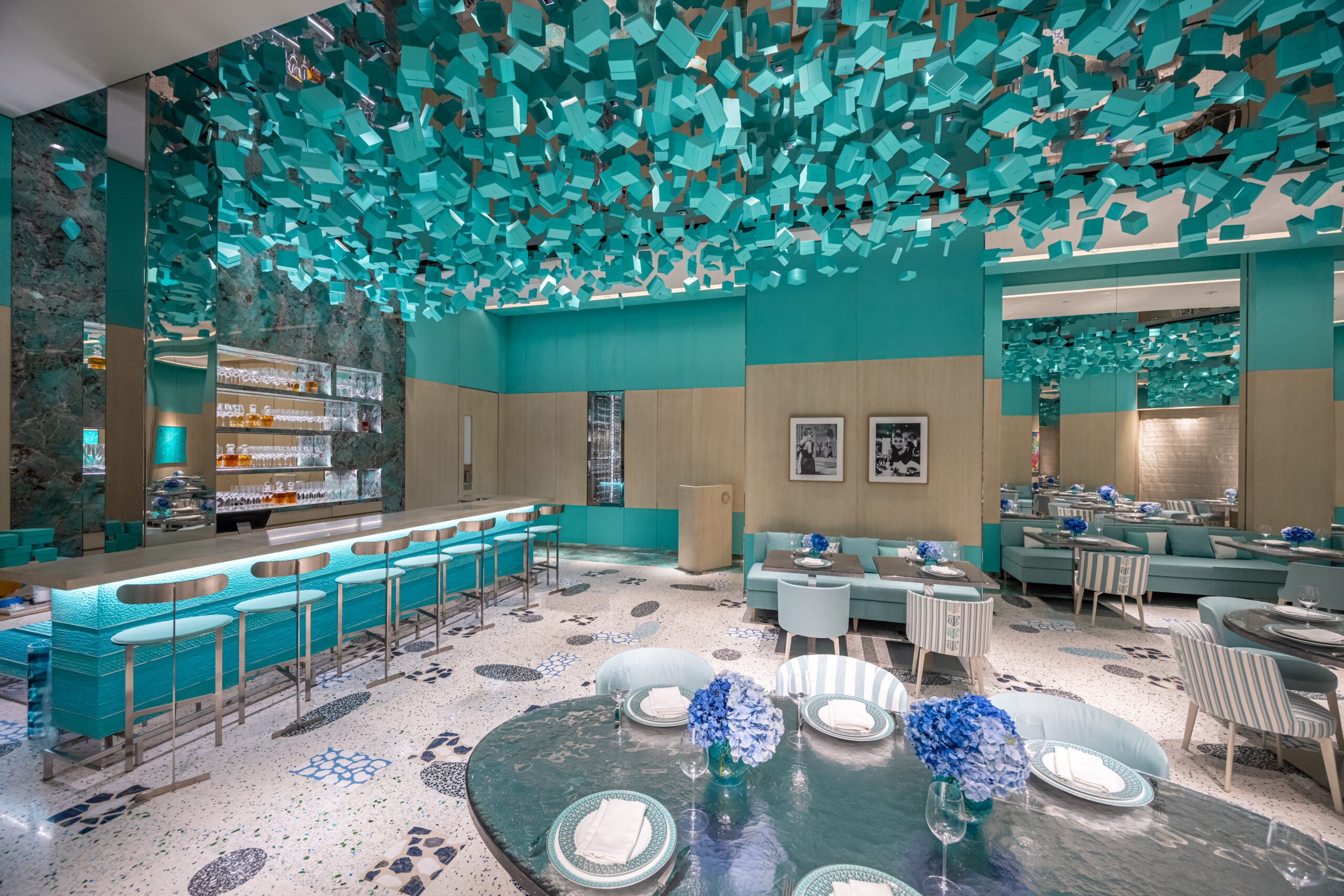 Interior of Blue Box Café at Tiffany & Co. South Coast Plaza with Tiffany Blue accents and a glass installation