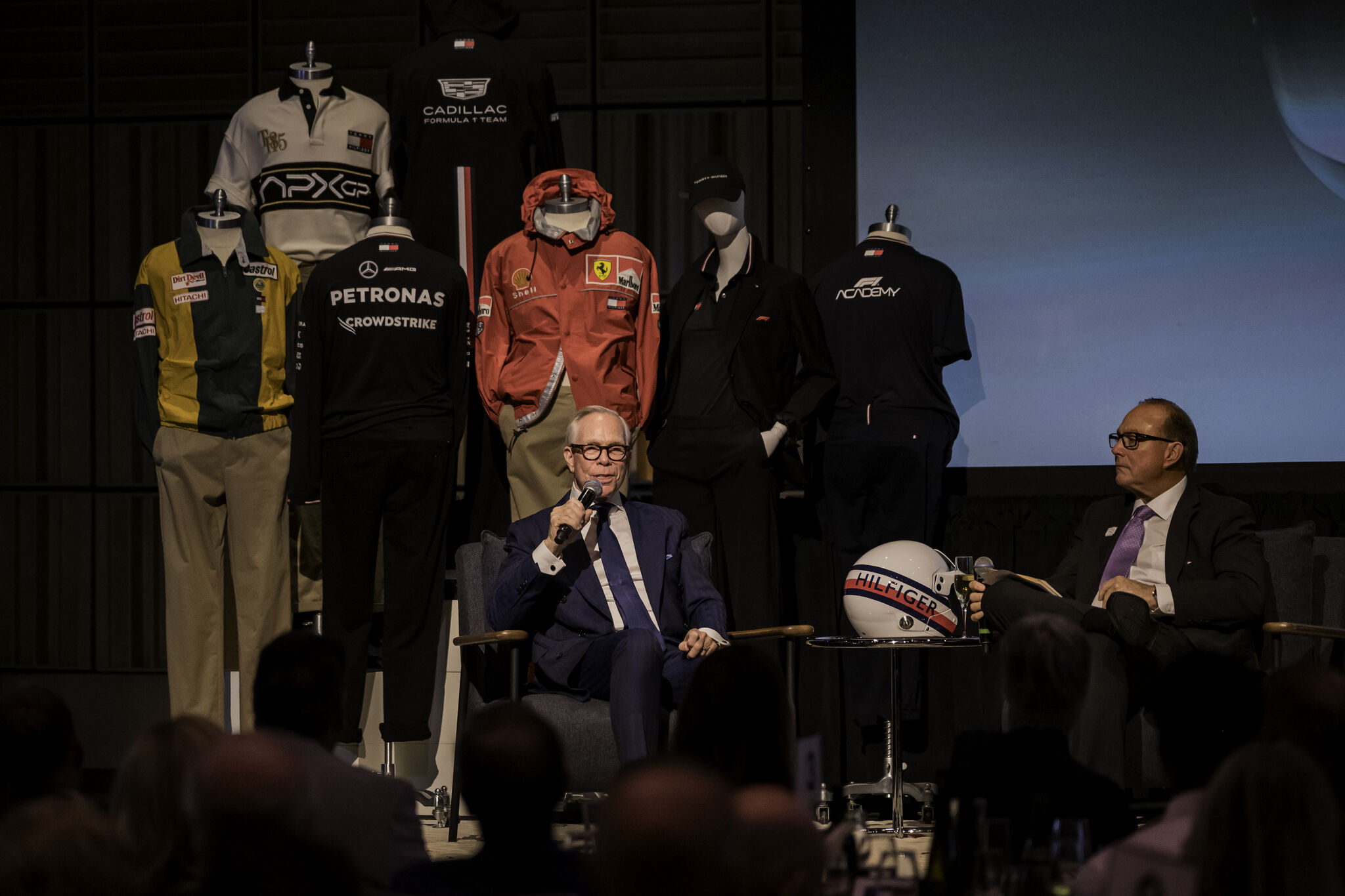 Gala stage displaying Tommy Hilfiger’s motorsports partnerships