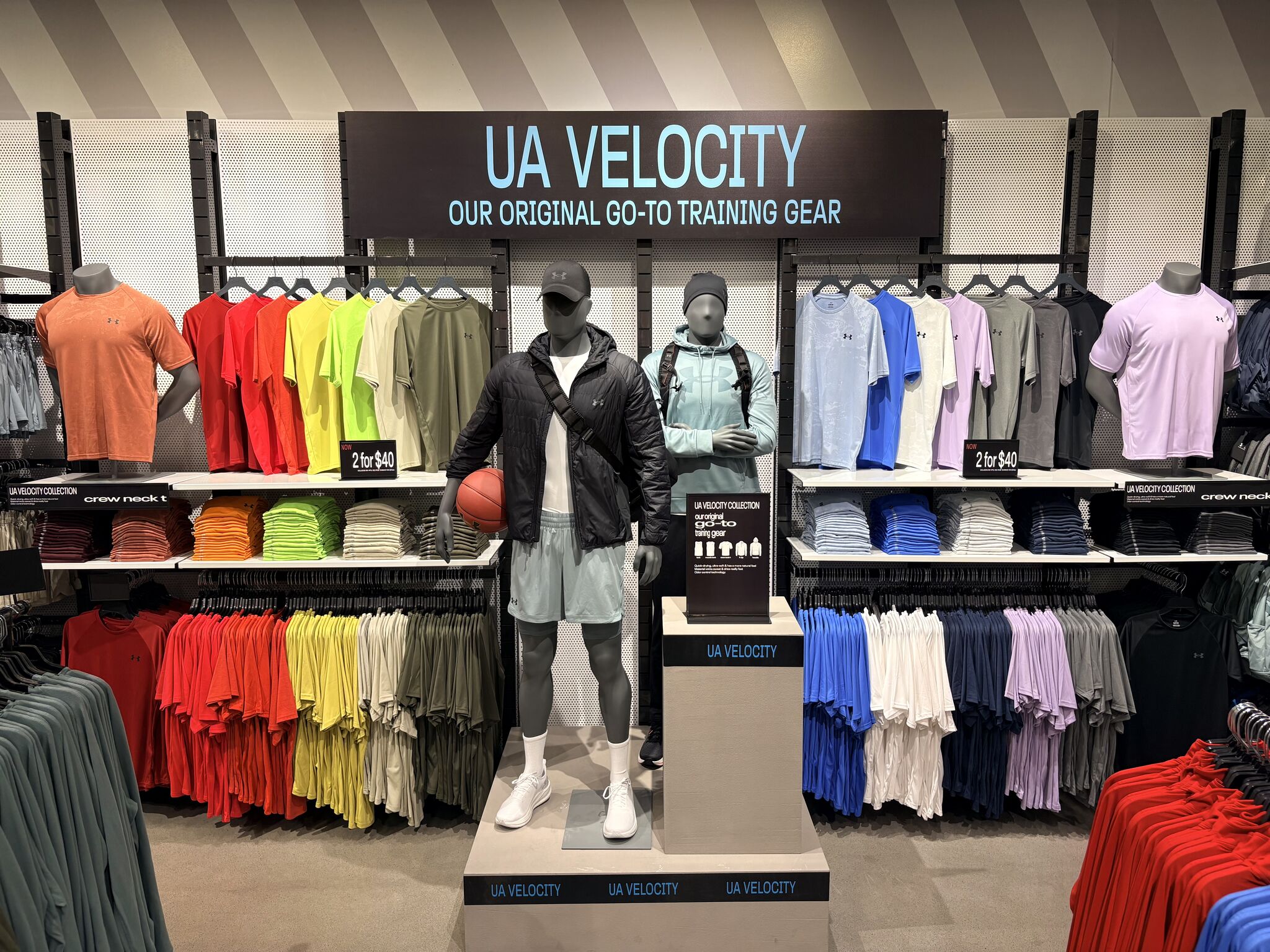 UA Velocity apparel assortment displayed in the Bozeman Sports House