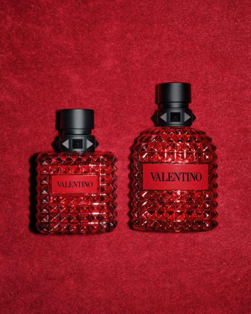 Two red Valentino Born in Roma Ruby fragrance bottles