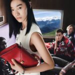 Versace Holiday 2026 cast in a lavender-seated train carriage