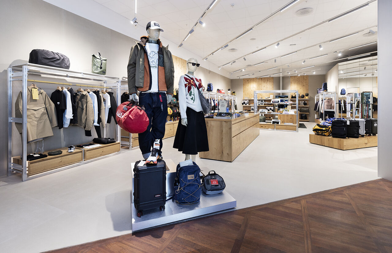 Apparel and accessories displays inside VF's O11 Copenhagen Airport store