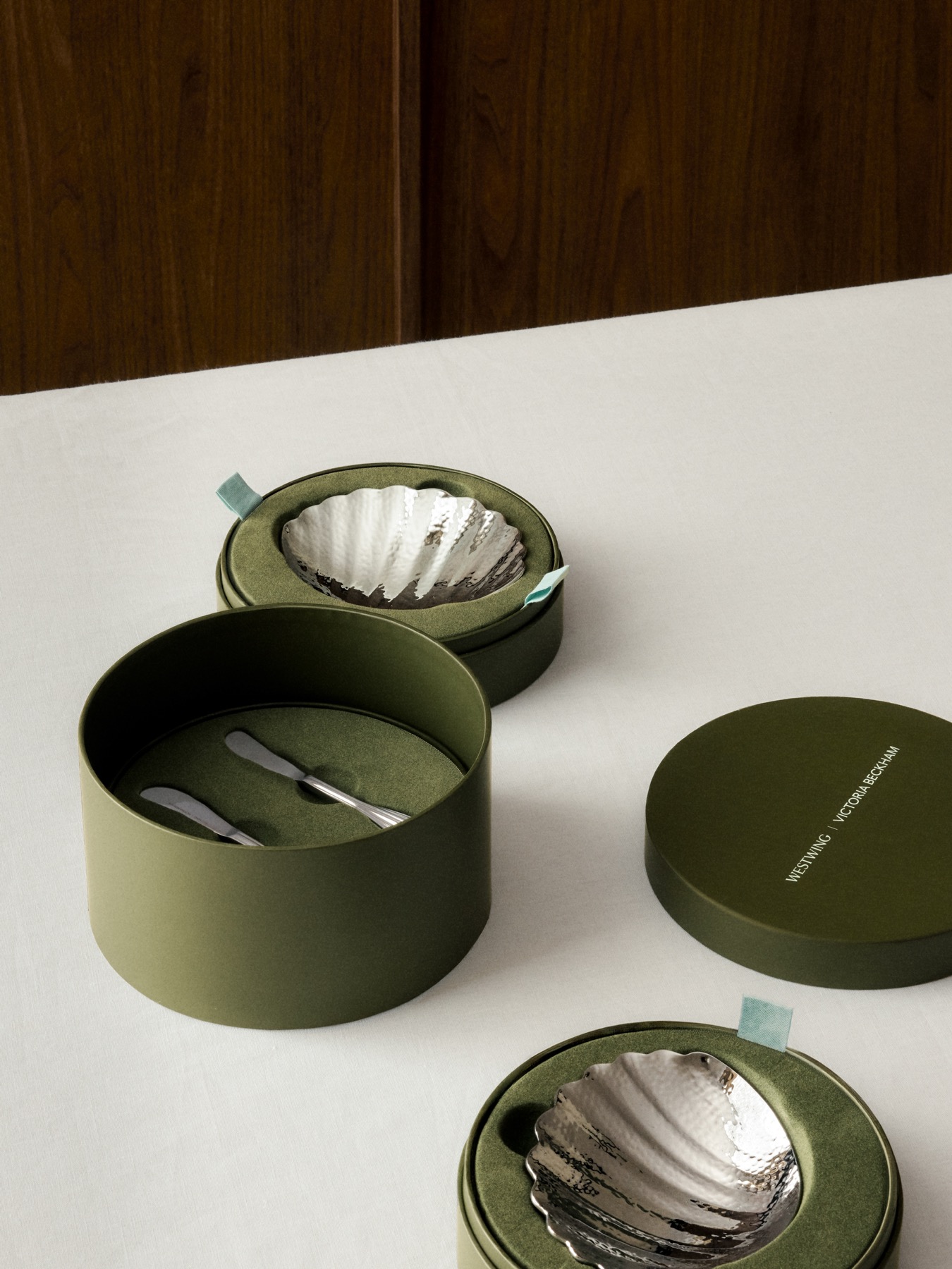 Shell-shaped silver butter dish in Westwing Victoria Beckham packaging
