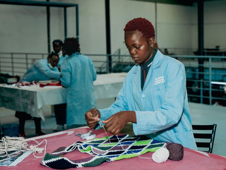 Artisan works on patterned accessories for Vivienne Westwood in Kenya