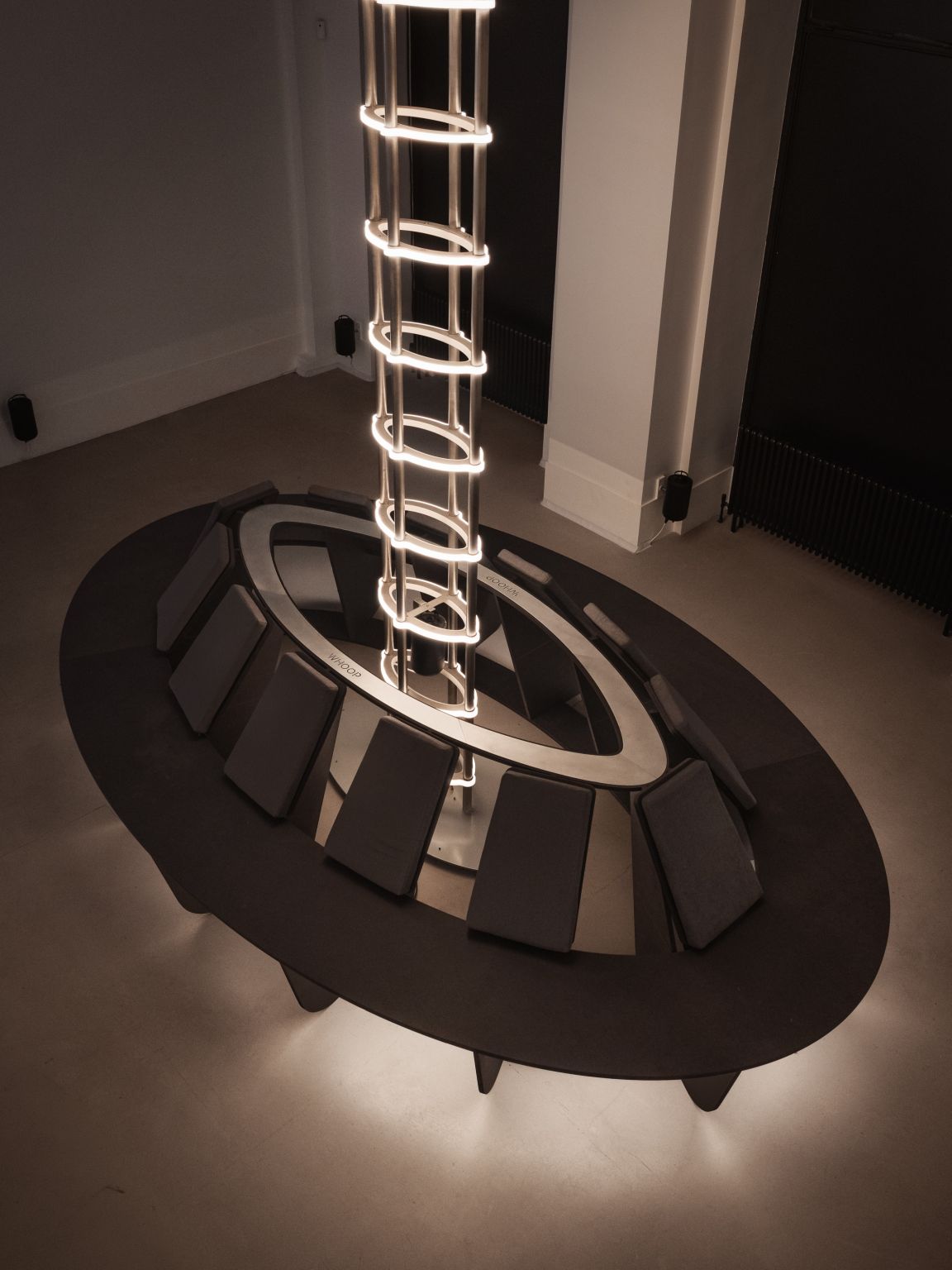 Circular seating and illuminated sound installation at WHOOP RECOVER 01 in Paris